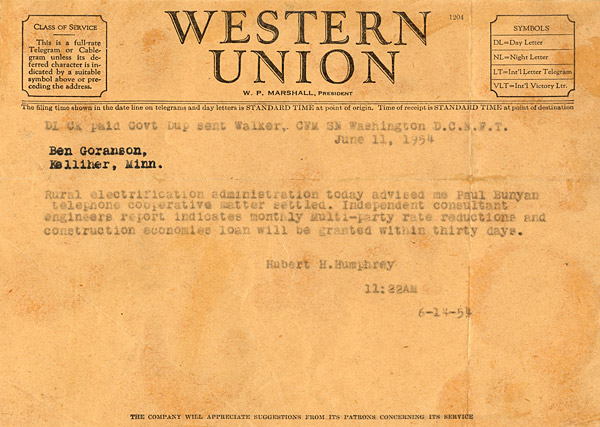 A telegram from Senator Hubert H. Humphrey stating an REA loan approval for Paul Bunyan Telephone.