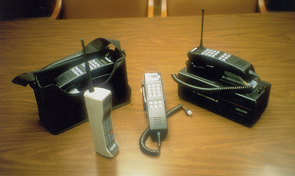 picture of 1980's mobile phones and pagers